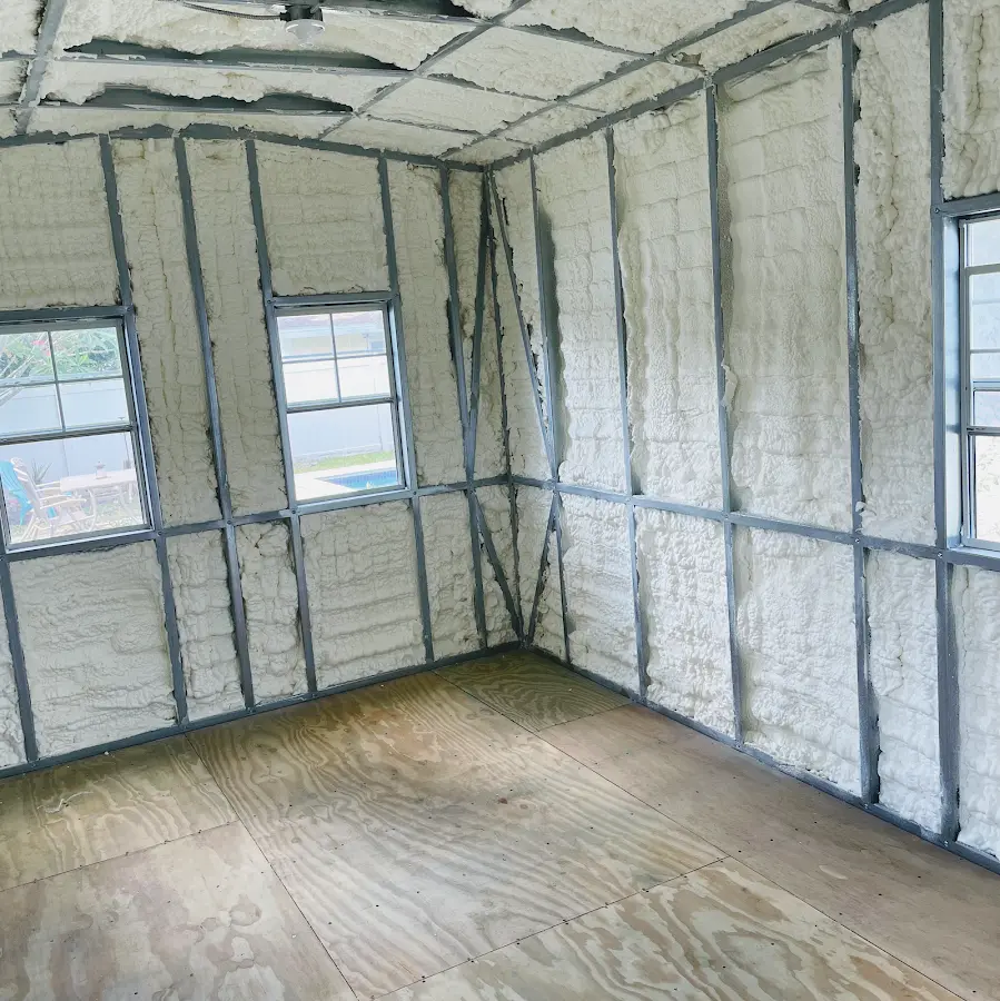 Closed-cell spray foam insulation applied to wall cavities in a residential project in Kihei